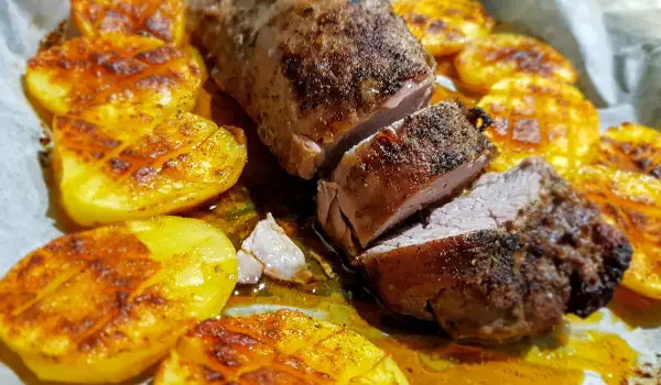 Solomillo de cerdo con patatas al horno