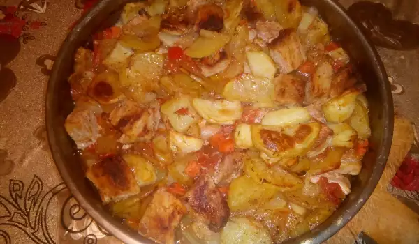 Carne de cerdo con patatas al horno