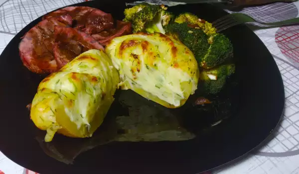 Codillo de ternera asado con patatas y brócoli