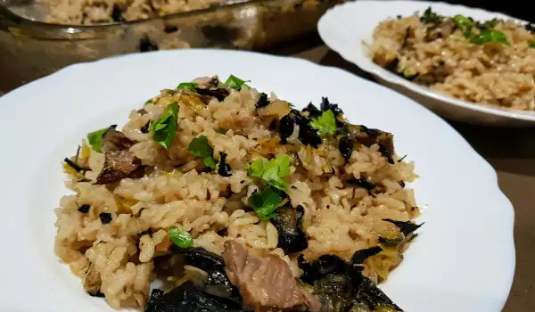 Arroz al horno con ternera, setas y puerros