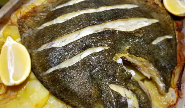 Rodaballo al horno con patatas y cebolla