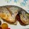 Dorada marinada, rellena de tomates cherry