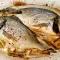 Dorada con puerros al horno