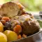 Cordero con patatas al horno
