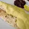 Merluza al papillote con salsa aromática