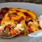 Moussaka con zanahorias, patatas y guisantes