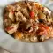 Arroz con verduras, cerdo y setas