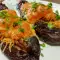 Berenjenas marinadas rellenas de huevo y queso