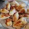 Calamares rellenos de prosciutto y queso