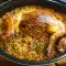 Conejo asado, relleno con arroz y champiñones