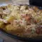 Pollo con patatas, champiñones y nata