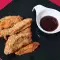 Pollo en julianas empanado con sésamo