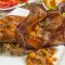 Conejo adobado al horno