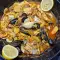 Suquet de marisco con dorada