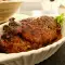 Paletilla de cerdo al horno con vino y miel