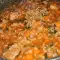 Carne de cerdo con arroz y tomates