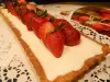 Tarta de panna cotta con fresas y albahaca