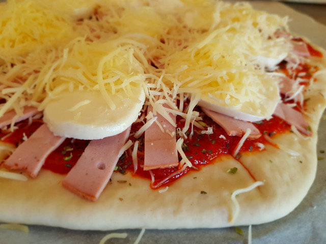 Pizza con corazón de queso