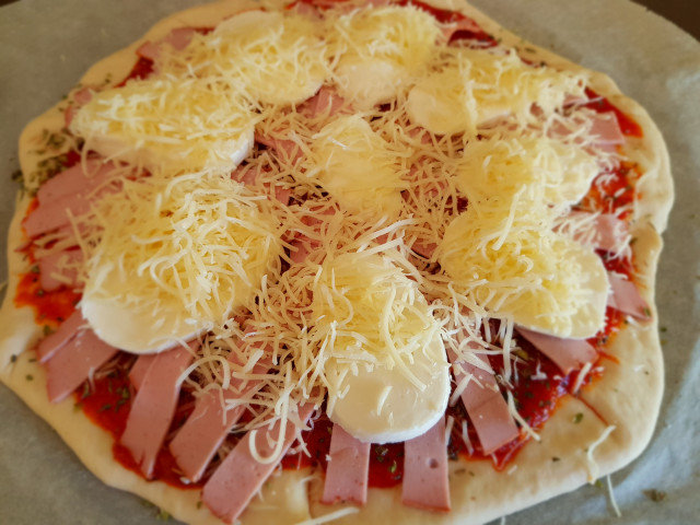 Pizza con corazón de queso