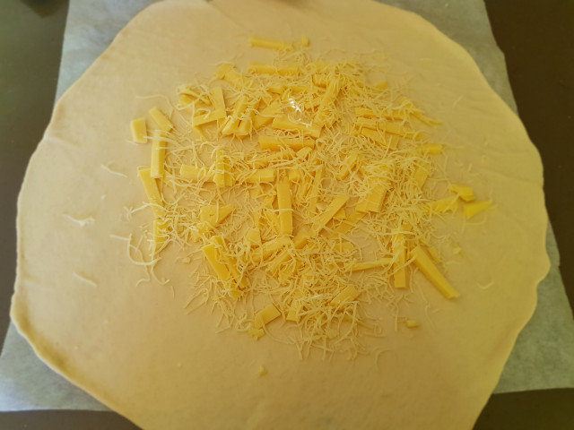 Pizza con corazón de queso